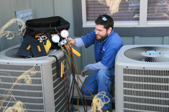 Air conditioning, technician or engineer on roof for maintenance ...